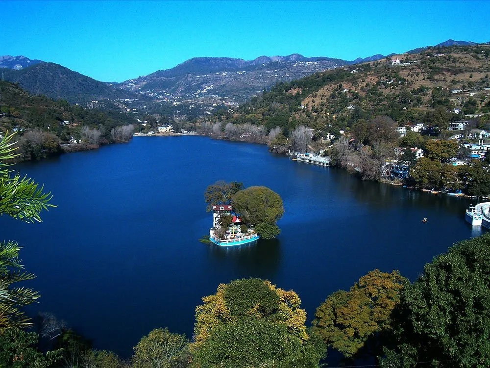 Emerald mountain lake waters in Bhimtal valley