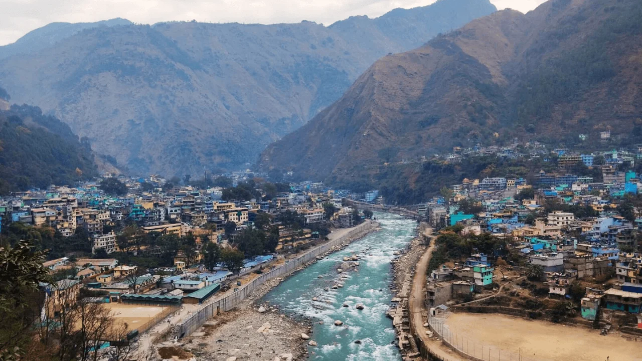 Expansive Himalayan mountain pass and river gorge in Uttarakhand